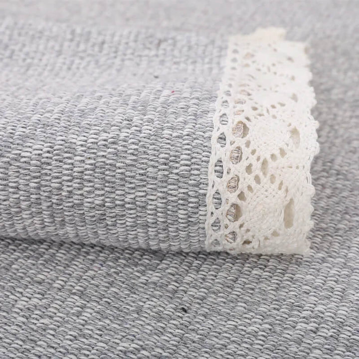 Soft cotton linen hand-woven couch cover in grey, a practical and aesthetic home textile