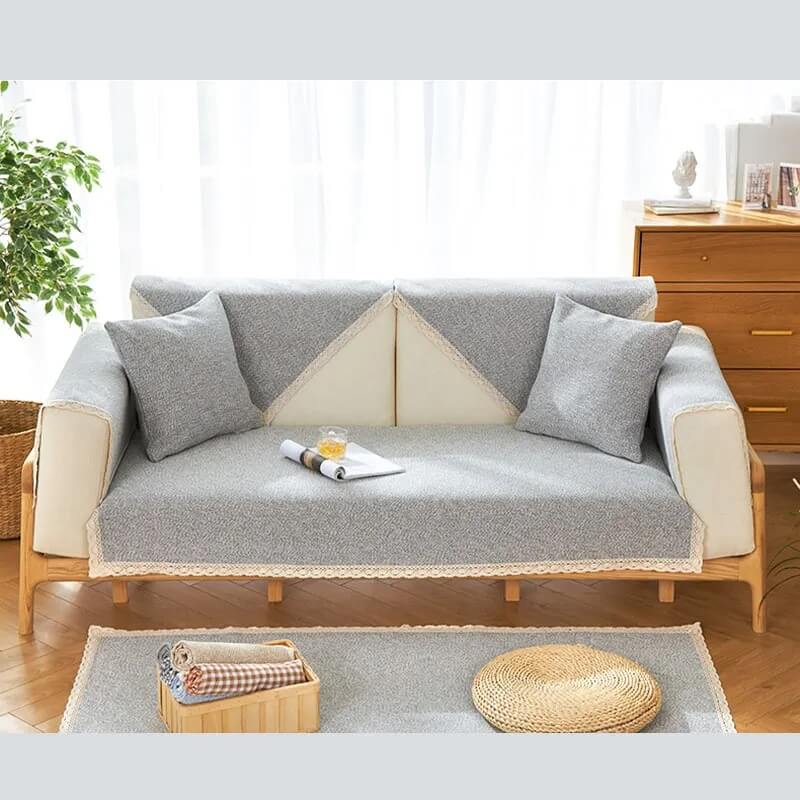 Swatch of hand-woven cotton linen fabric, highlighting the quality of the non-slip couch cover