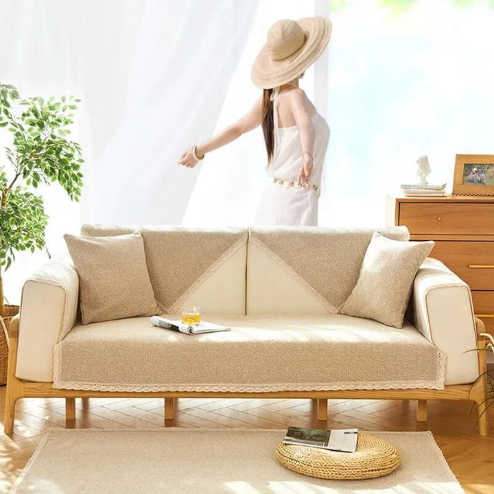 Close-up of the textured cotton linen weave of a non-slip couch cover, showcasing quality