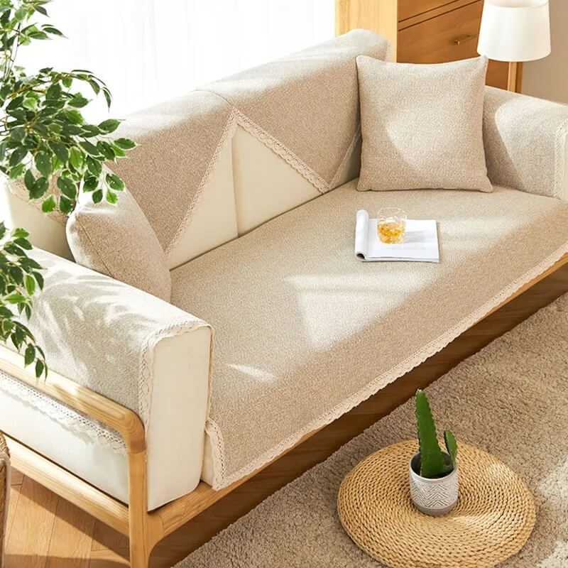 Lifestyle shot of a living room with a hand-woven cotton linen couch cover, enhancing decor