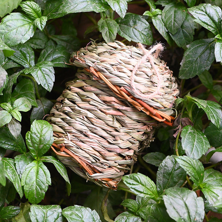Green hand-woven straw bird house, a charming and rustic decorative cage for small pet birds