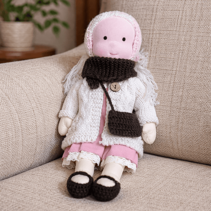 Soft and safe cotton Waldorf doll, a perfect plush toy for children's imaginative play.
