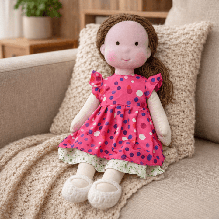 Lovable handmade cotton Waldorf doll, inspires imaginative play and cuddles for children.