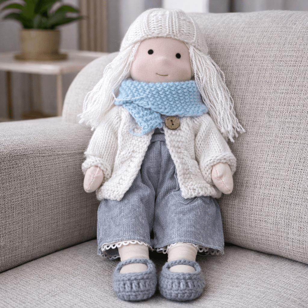 Soft handcrafted Waldorf doll, natural cotton, perfect for imaginative kids' play.