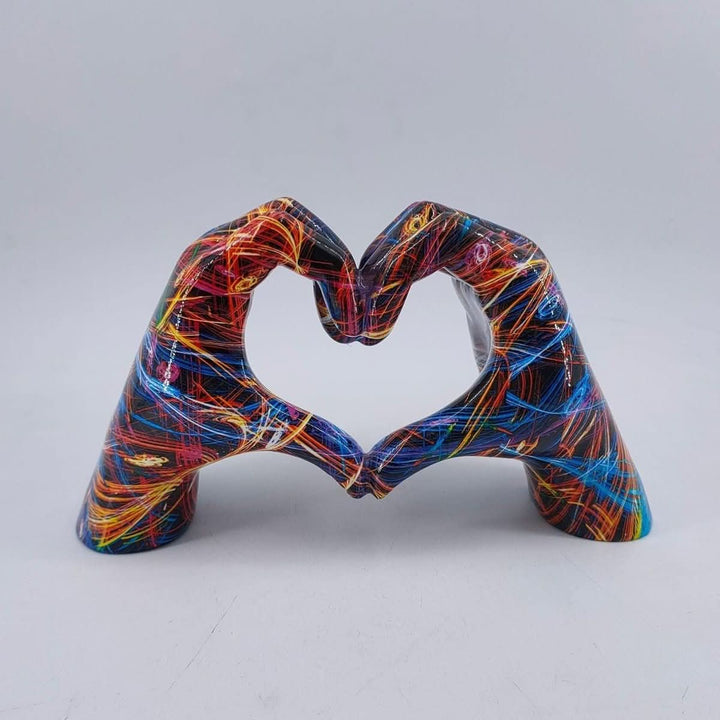 Inviting Heart Hands Wood Sculpture, handcrafted artisan decor bringing warmth and love to cozy home settings.