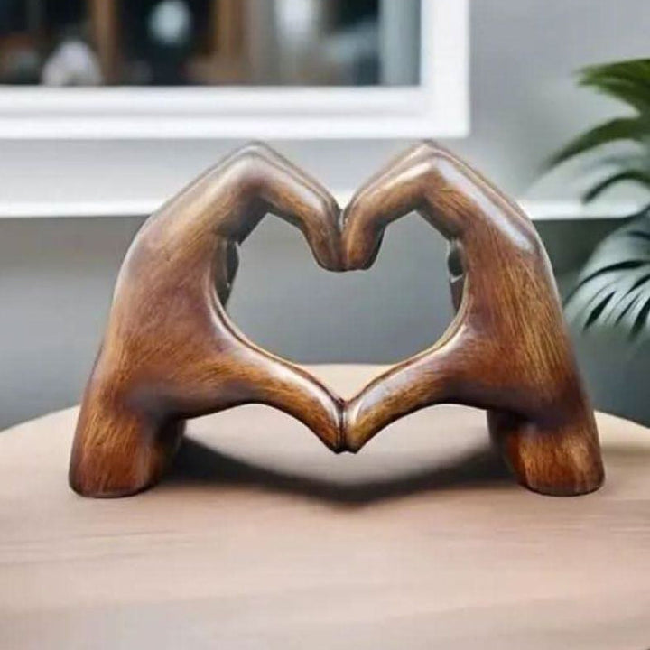 Warm wooden Heart Hands Sculpture, a beautiful love symbol and handcrafted art gift for any home decor.