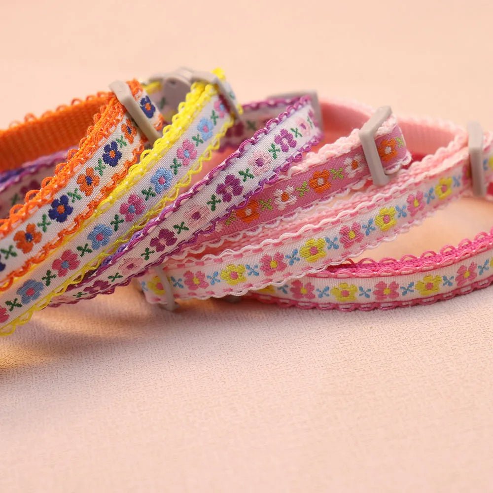 Pet accessory: colorful floral handmade collar with bell, ideal for both cats and puppies.