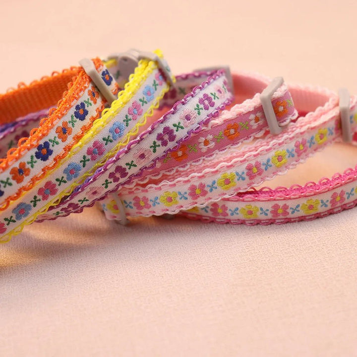Pet accessory: colorful floral handmade collar with bell, ideal for both cats and puppies.