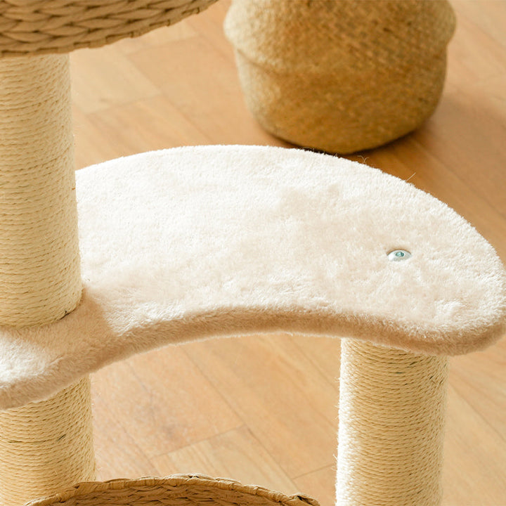 Cozy cat furniture tree with a plush sleep bowl and sisal scratching post, ideal for pet relaxation and play.