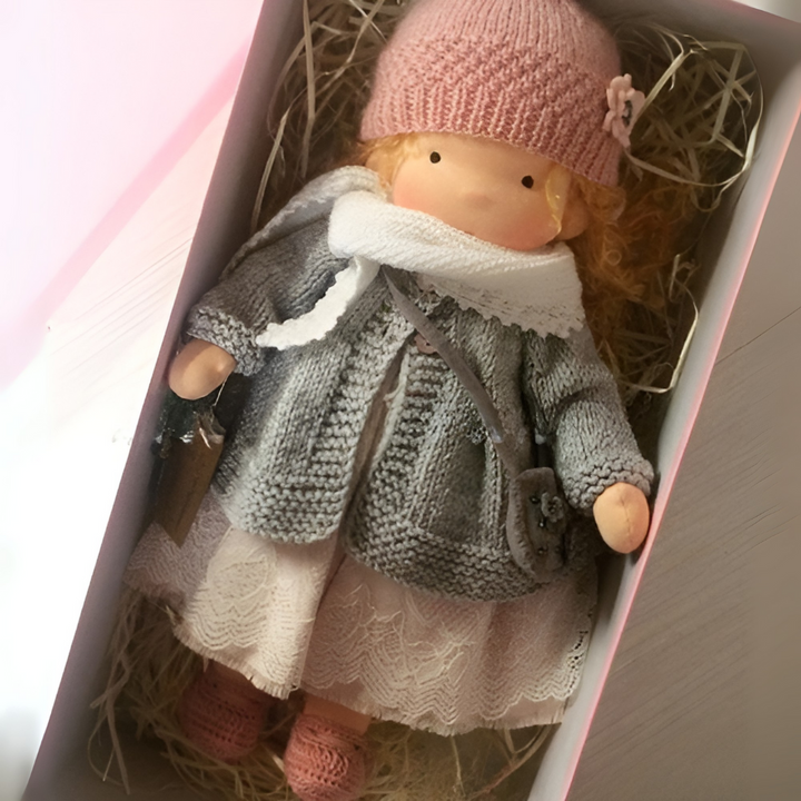 Children's handmade cloth doll, a soft organic cotton toy for comforting imaginative play.