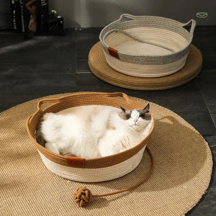 Handwoven cotton rope cat bed, natural & eco-friendly, providing cozy feline comfort & stylish pet furniture.