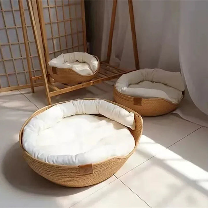 Durable handwoven cotton pet bed with a removable cushion, an eco-friendly choice for cats.