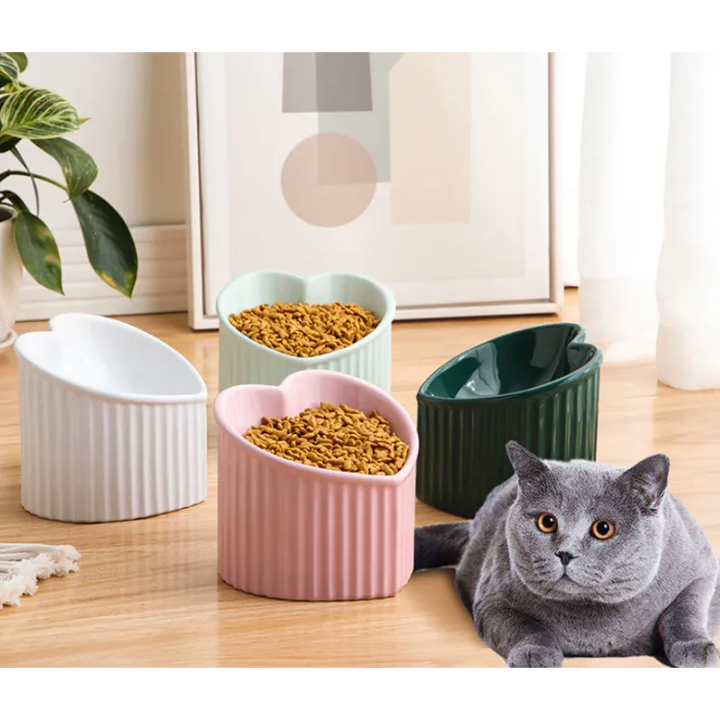 Heart-shaped ceramic pet bowl in white, perfect for cats or small dogs, hygienic feeder dish.