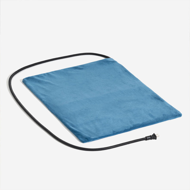 Boxed heated pet pad for dogs & cats highlighting features: waterproof, chewproof, and easy to clean.