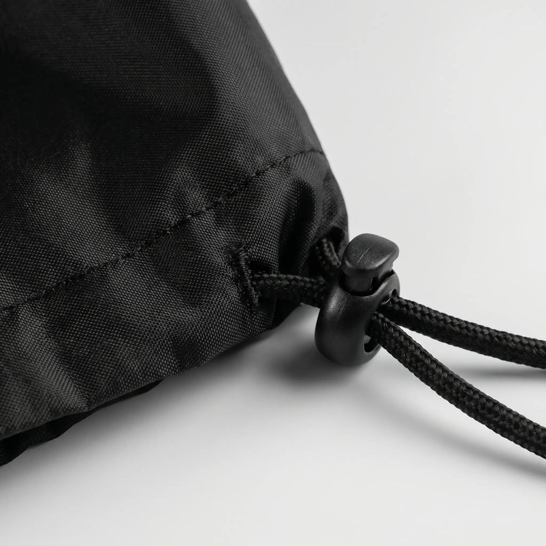 Outdoor round grill cover for kettle grills. Heavy-duty, weather-resistant protection for your BBQ accessory.