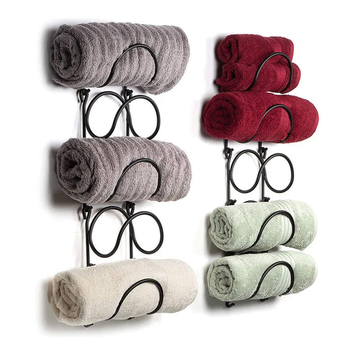 Multi-layer rustproof wrought iron towel rack organizer. Wall mount storage solution for modern spa bathroom decor.