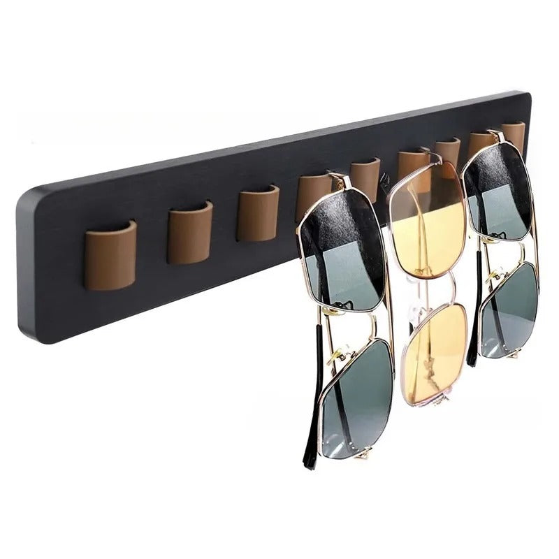 Stylish bamboo wood glasses display rack, wall-mounted for convenient eyewear storage & home decor.