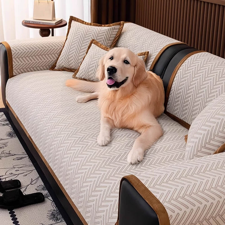 Herringbone chenille sofa protector in light grey, anti-slip design for pet-friendly furniture protection.