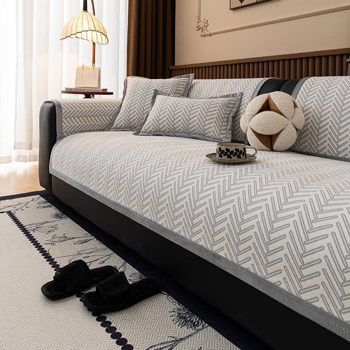 Chenille sofa protector with a matching pillow option, showing complete furniture harmonization.