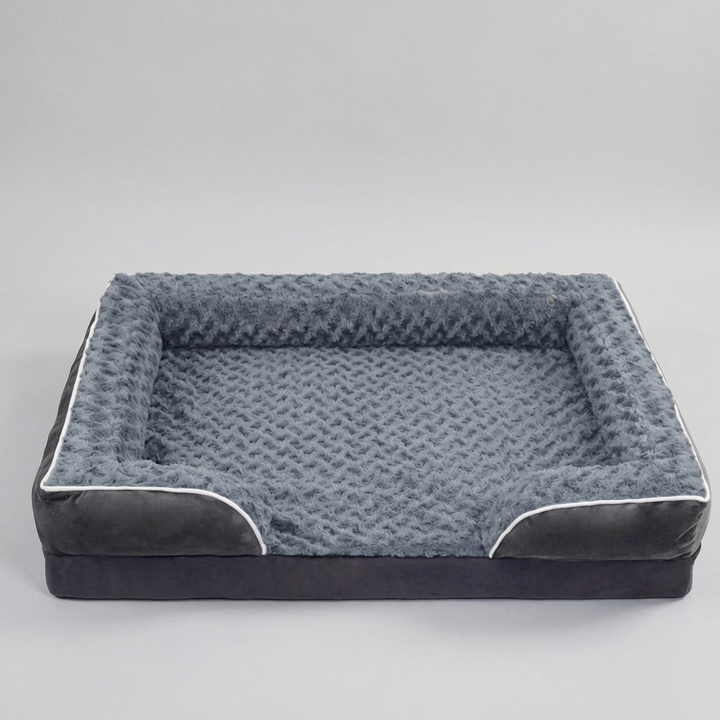 Cozy orthopaedic dog bed with joint support for small to large dogs. Features a water-repellent, washable cover.