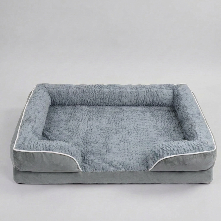 Premium orthopaedic dog bed for pet comfort & joint support. Washable, water-repellent, and suitable for all dogs.