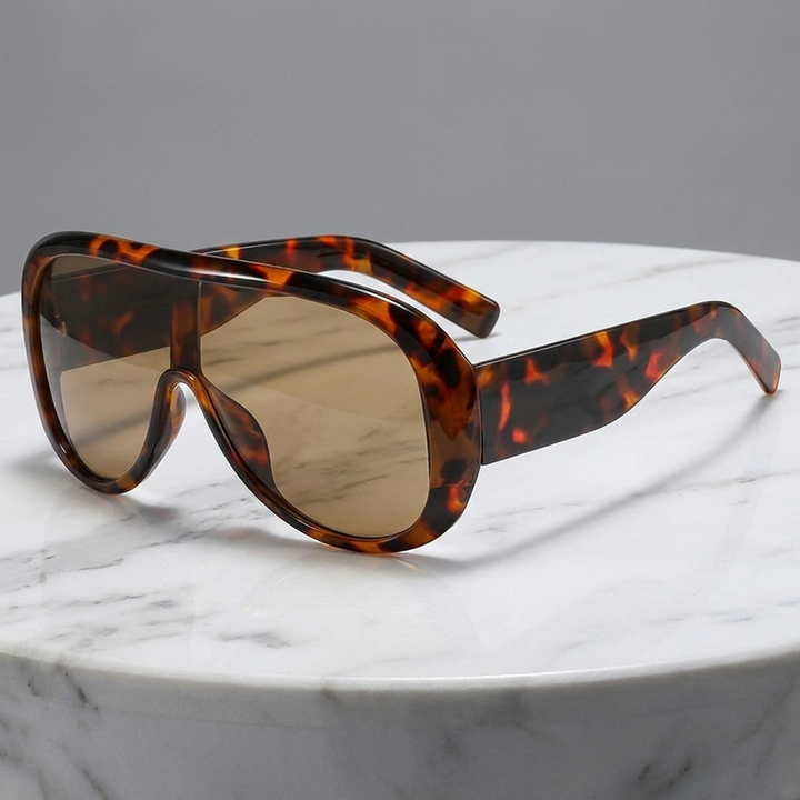 Women's modern pilot sunglasses, offering superior UV400 protection, a lightweight & elegant accessory.