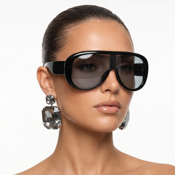 Sophisticated women's pilot sunglasses offering UV400 protection, a chic summer eyewear accessory.