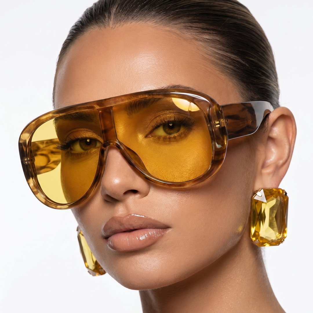 Chic women's pilot sunglasses, UV400 protected for eye safety, a sophisticated and stylish travel essential.
