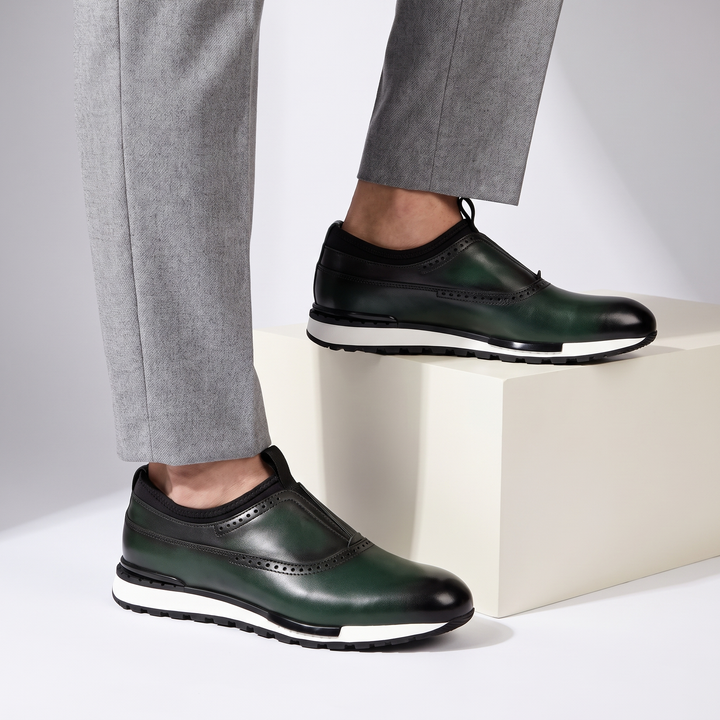 Green men's comfortable slip-on loafers, ideal everyday shoes for a relaxed yet polished style.