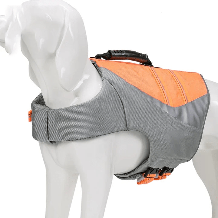 Adjustable dog life vest with bright color, pet floatation device for canine water safety and visibility.
