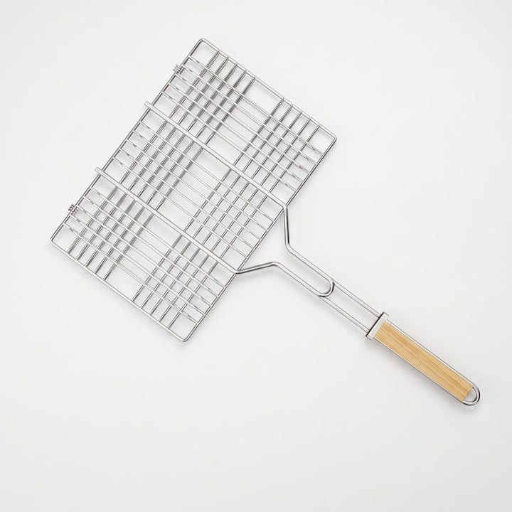 Outdoor essential: non-stick grill basket for flipping delicate fish and crisp veggies over a campfire or BBQ.