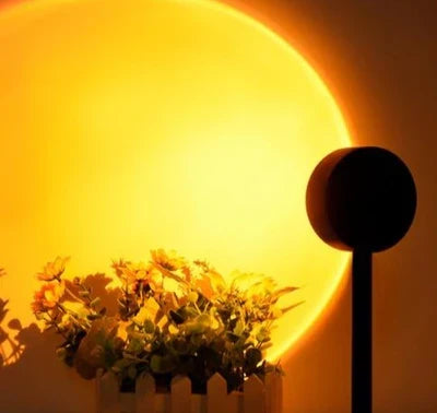 Relaxing multi-color sunset projection lamp, bringing aesthetic ambient light & a calming mood to your home.