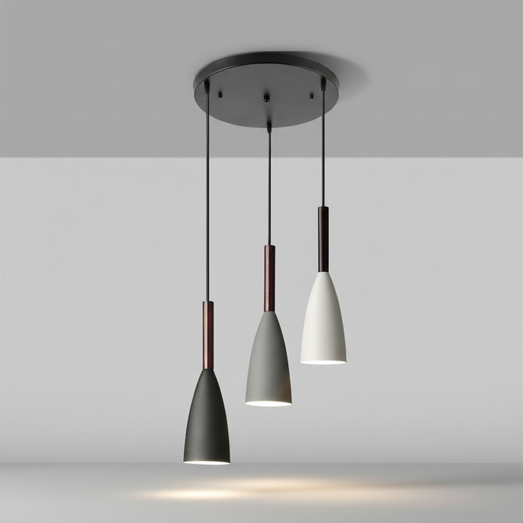 Chic triple pendant light, perfect for dining room lighting. Scandinavian style home decor accent.
