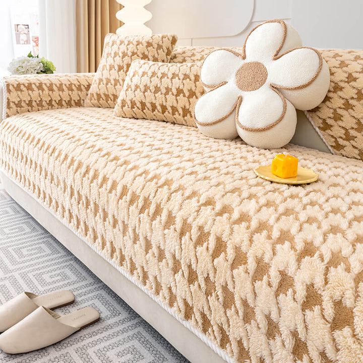 Beige houndstooth plush sofa protector, anti-slip couch cover for sectional furniture home decor.