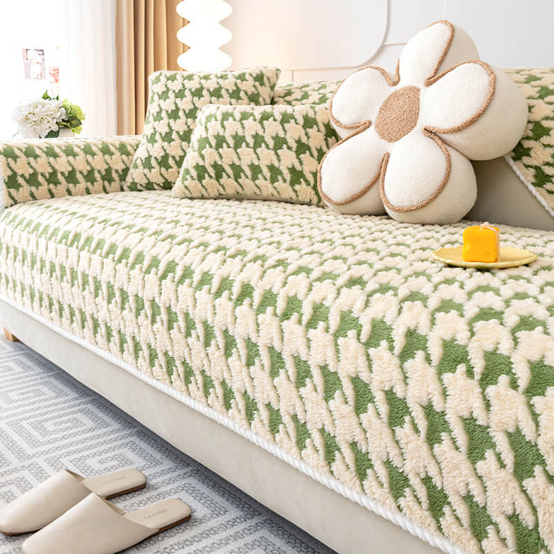 Houndstooth pattern plush sofa mat, anti-slip furniture protector for modern living rooms.