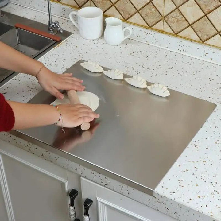 Durable, easy-clean stainless steel cutting board for hygienic food preparation. Features non-slip design.