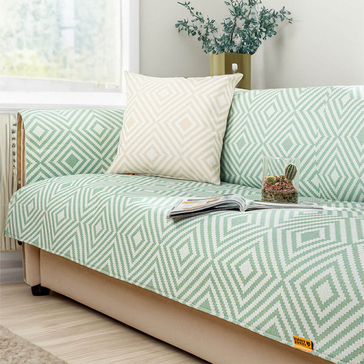 Cooling geometric sofa cover in refreshing blue tones, providing a non-slip and comfortable home decor solution.