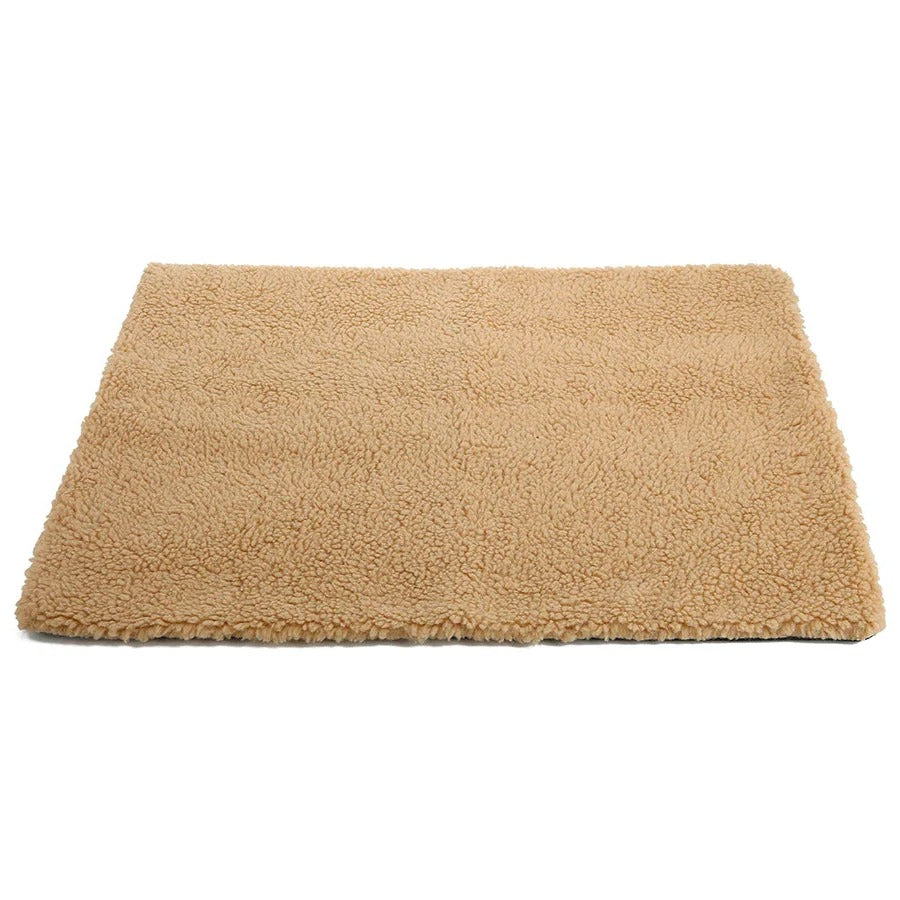 Soft faux fur self-heating pet mat, non-electric, provides warmth & comfort for cats & dogs.