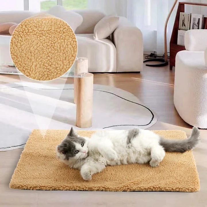 Self-warming pet pad for dogs & cats. Non-electric, washable, cozy faux fur mat for winter comfort.