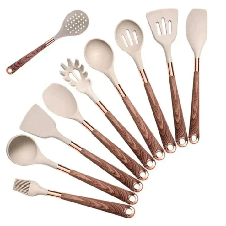 Modern silicone kitchen tool set with elegant wooden handles. Essential cooking accessories for every home chef.