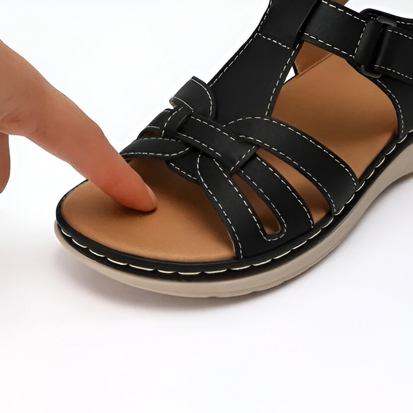 Adjustable women's comfort sandals in brown, providing therapeutic arch support for active feet.