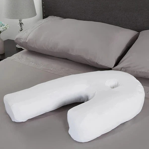 Memory foam side sleeper pillow, features an ear hole to relieve pressure, providing therapeutic neck support.