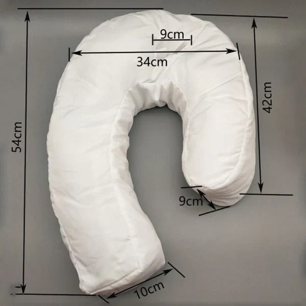 Unisex ergonomic ear pillow with a soft washable cover, designed for side sleepers to relieve ear pressure.