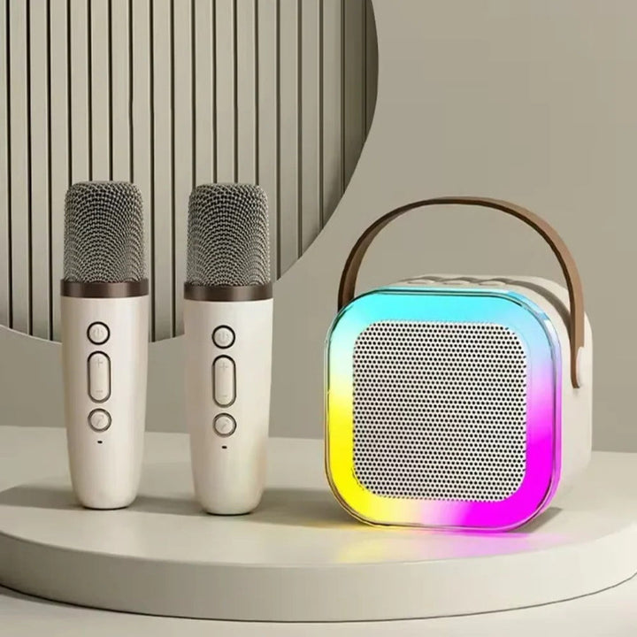 Sleek portable karaoke speaker with powerful audio, integrated handle & intuitive controls for entertainment on the go.