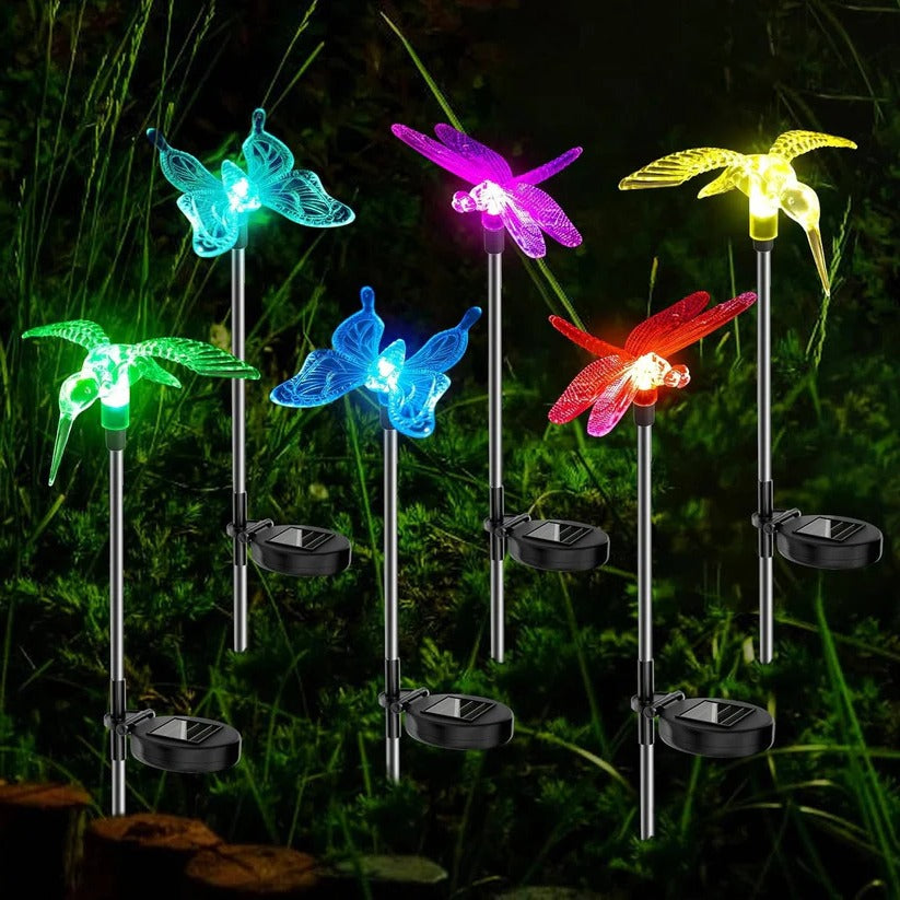 6-piece solar LED garden stake lights with crystal figurines for pathway & flower bed decor. Waterproof.