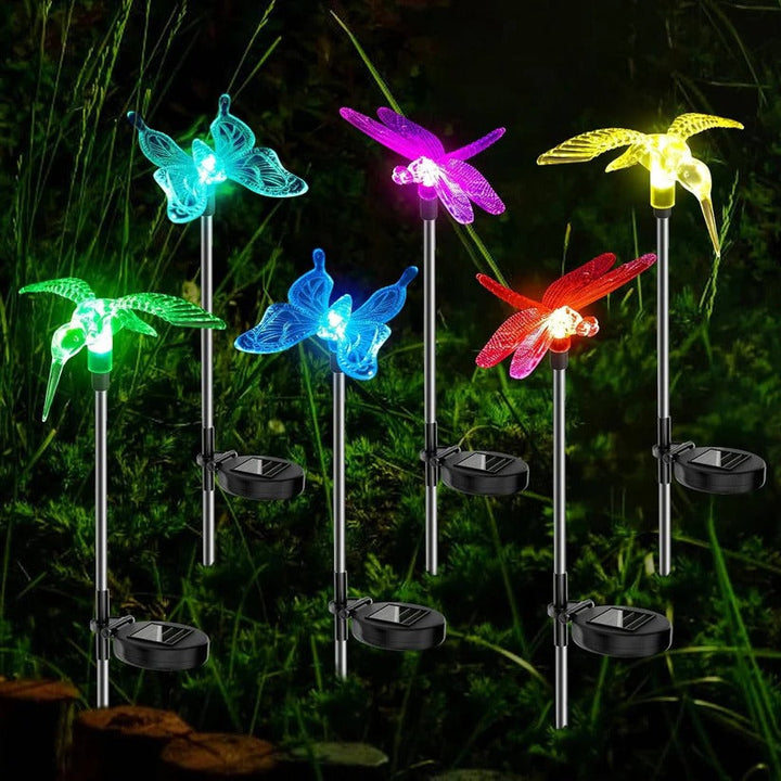6-piece solar LED garden stake lights with crystal figurines for pathway & flower bed decor. Waterproof.