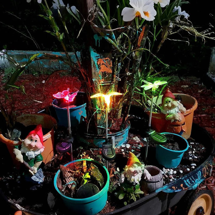 Decorative solar garden pathway lights, waterproof LED stake lights with crystal animal figurines for landscape.