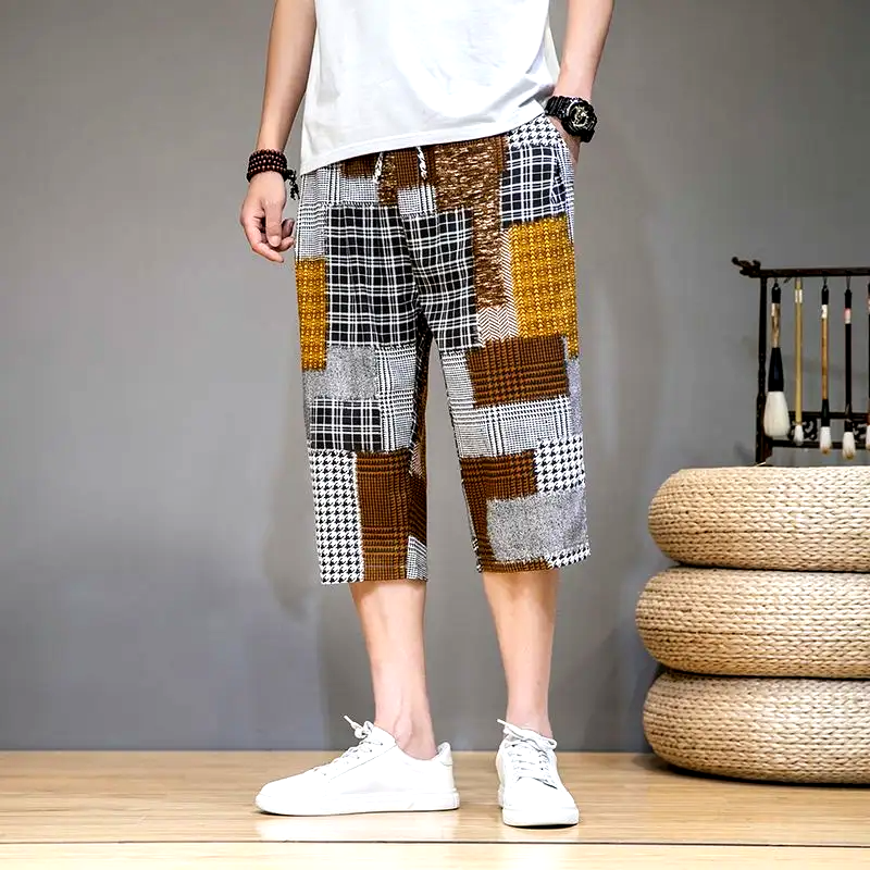 Versatile men's unique patch capris shorts, great for summer fashion, streetwear, or a bold casual style statement.