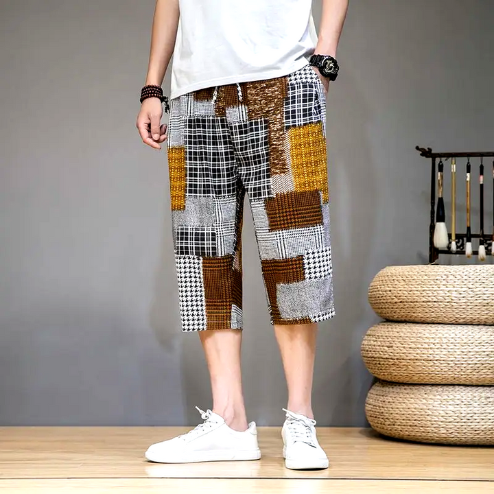 Versatile men's unique patch capris shorts, great for summer fashion, streetwear, or a bold casual style statement.