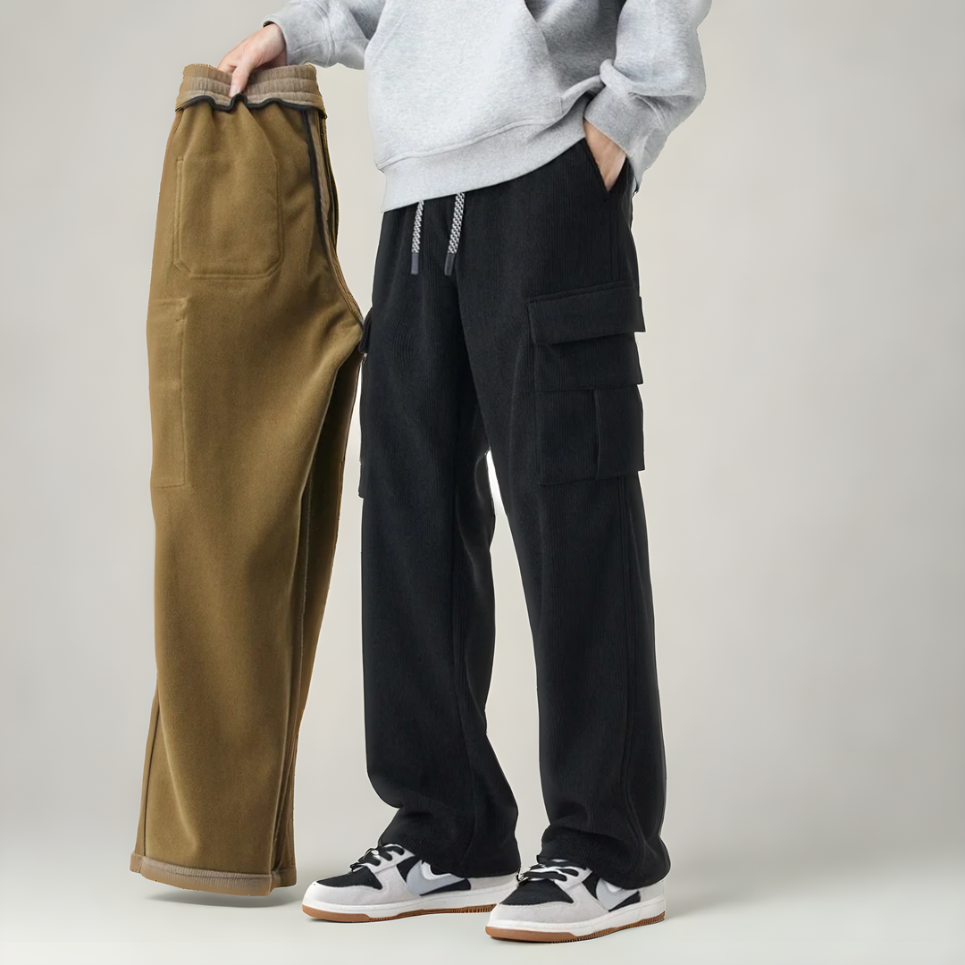 Comfortable men's black cargo sweatpants, featuring spacious pockets & FlexFit waist for casual or lounge wear.